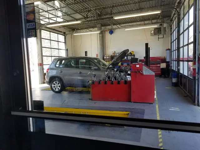 A car on the lift in one of the Express Oil service bays