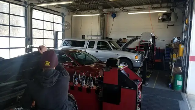 Cars up on the lifts in the Express Oil service bays